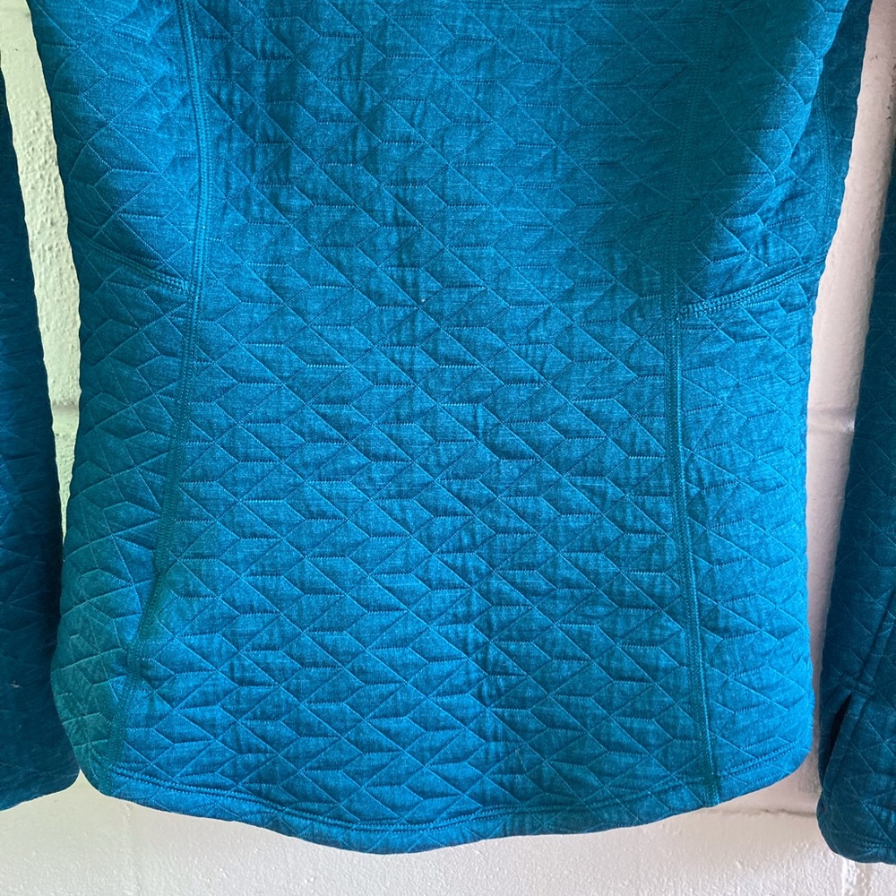 Marmot For Life: cowl neck pullover jacket; quilted polyester/ pouch pockets.